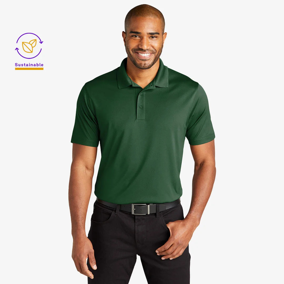 Man wearing Port Authority Men's Recycled Performance Polo Shirt in Forest Green Front - K863